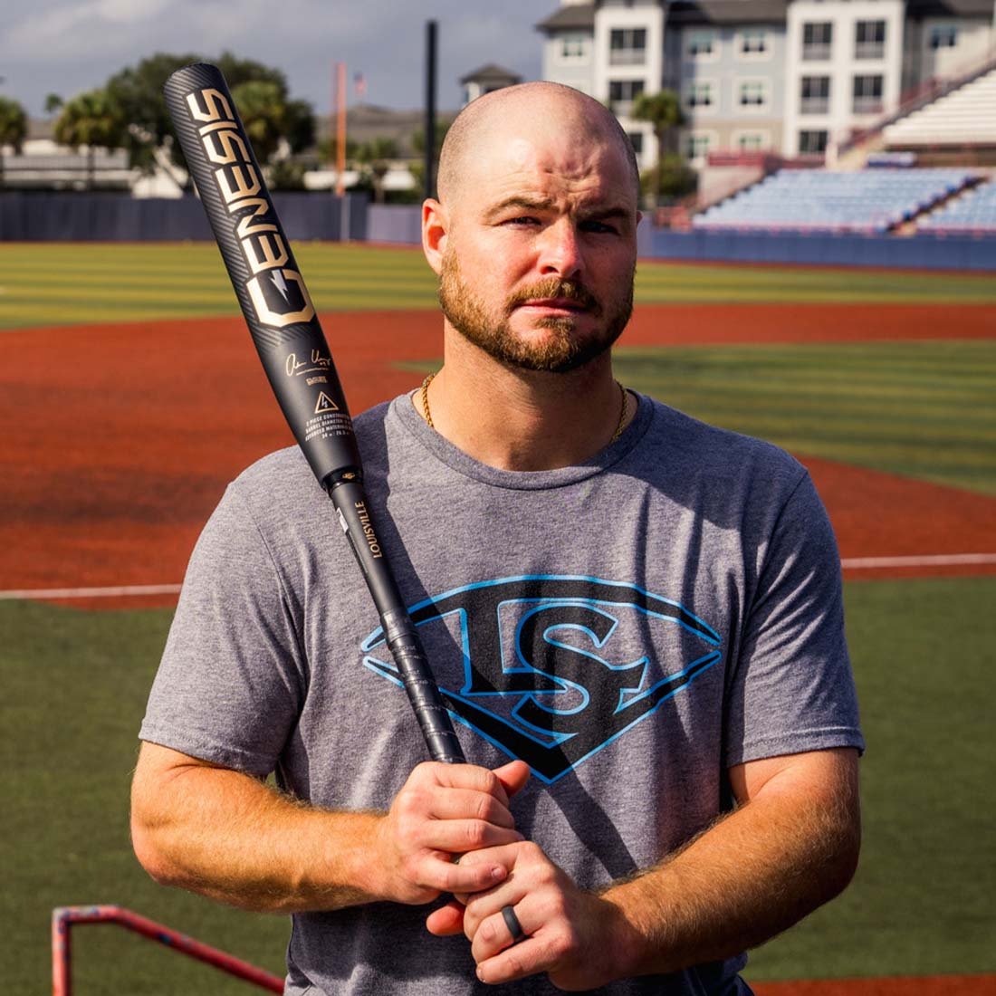 Genesis Adam Ussery barrel close up showing black finish and gold Genesis graphics while holding his bat at Space Coast Stadium