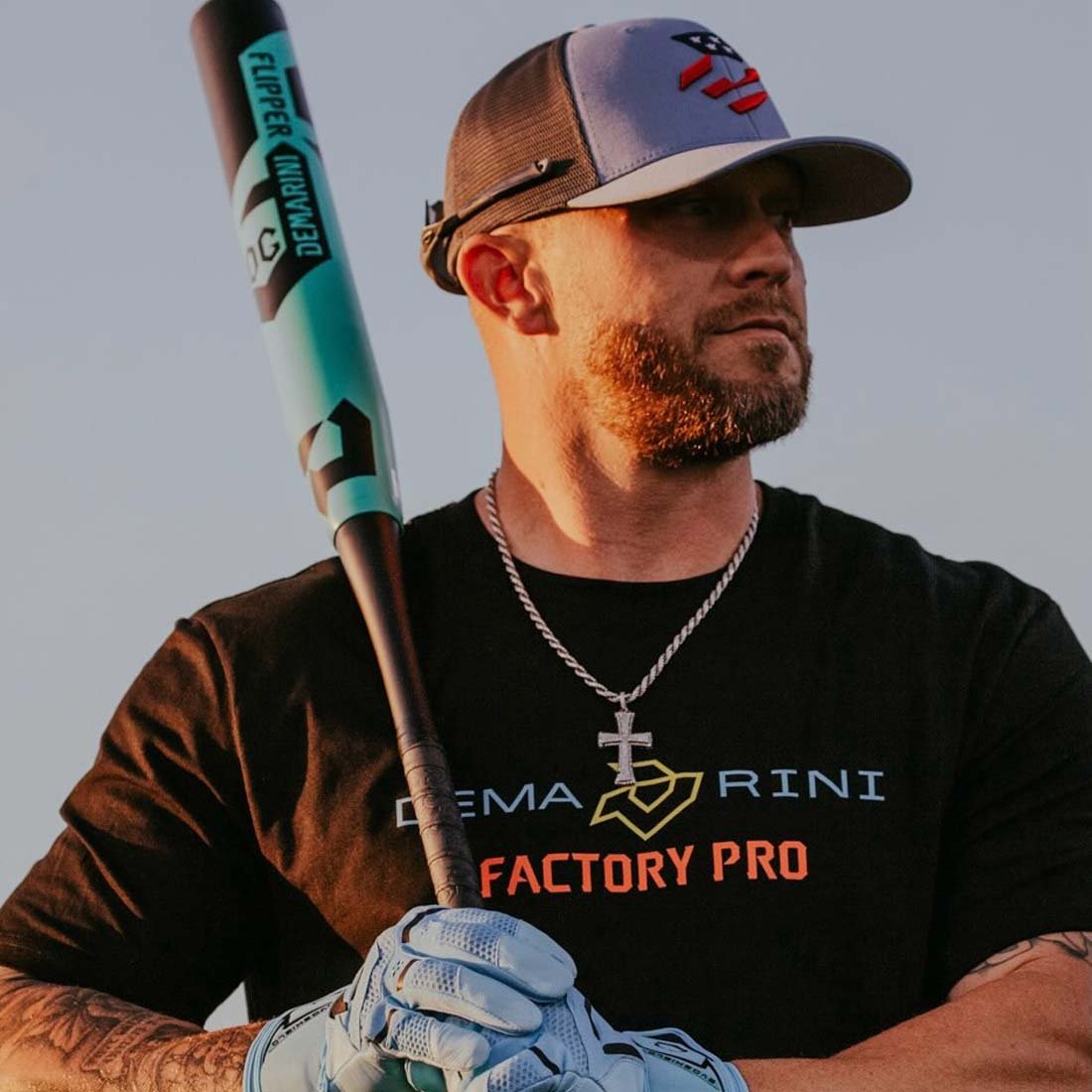2027 DeMarini Flipper USA slowpitch softball bat 13 inch midload gapped wall barrel ZnX alloy handle held by a DeMarini pro player 
