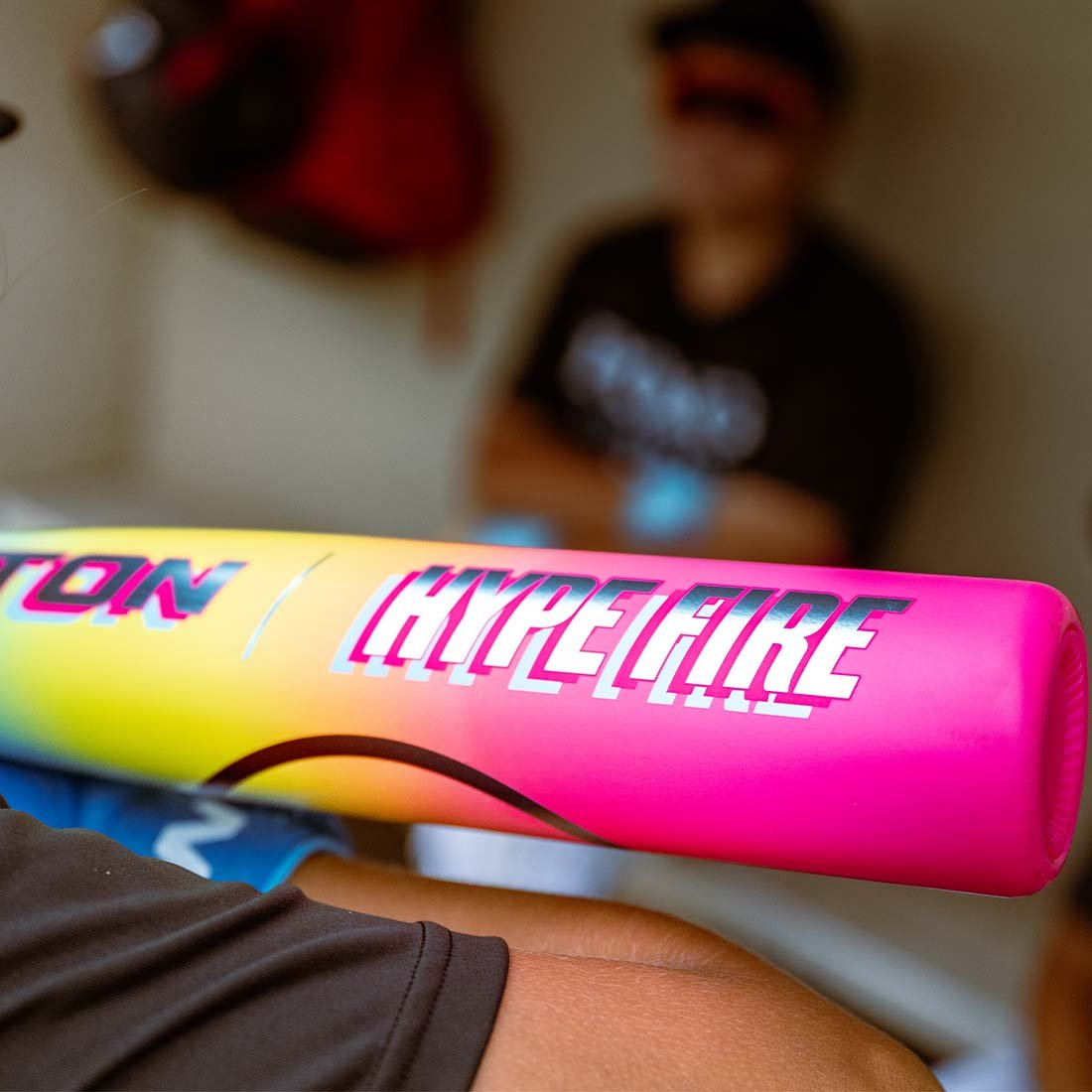 2026 Easton Hype Fire USSSA 2 3/4" Baseball Bat up close in the dugout
