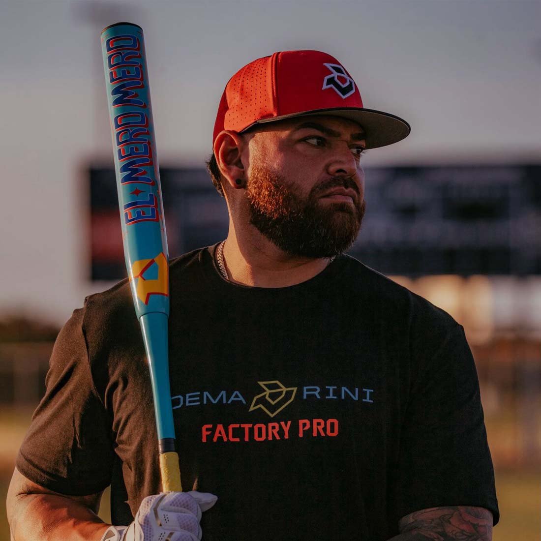 2027 DeMarini El Mero Mero USSSA slowpitch softball bat 13 inch balanced APC composite barrel held by a DeMarini Pro Player